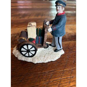 Vintage Mervyns 1998 Christmas Village Accessory Man Luggage Porter Figurine